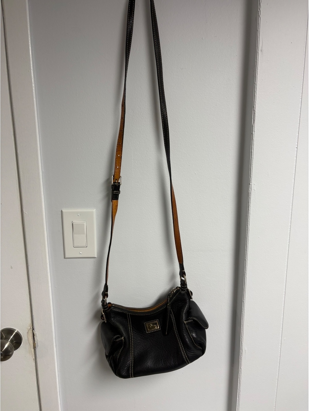 Dooney & Bourke Black Leather Crossbody Bag with Brown Strap